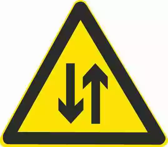 这个标志的含义是提醒前方道路变为不分离双向行驶路段。